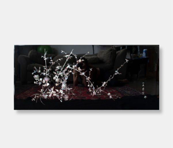 Vietnamese lacquer tabletop titled "Elegant Blossoms," featuring intricate mother of pearl inlay depicting blooming flowers and branches against a dark lacquer background, with Chinese writing and a logo signature.